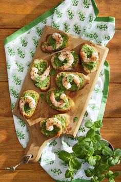 small sandwiches with pesto and shrimp on them