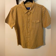 Very Nice! Love The Soft Organic Cotton Fabric. Dark Mustard Yellow. Casual Yellow Tops With Pockets, Casual Yellow Top With Pockets, Yellow Short Sleeve Shirt With Pockets, Casual Yellow Cotton Camp Shirt, Yellow Fitted Short Sleeve Shirt, Casual Gold Shirt For Spring, Gold Casual Shirt For Spring, Gold Cotton Short Sleeve Shirt, Gold Short Sleeve Cotton Shirt