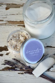 lavender sugar scrub in a glass jar next to a spoon