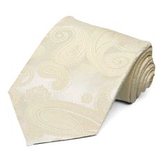 Made to fit big and/or tall men, this extra long tie in ivory on ivory paisley is ideal for just about any occasion! Wear it to work, or a formal event in winter, spring, summer or fall. Perfect for your wedding day attire. As part of our special purchase collection, this tie is only available while supplies last. This tie is an extra long length and standard width, made to fit big and/or tall men. Product Features • Traditional 3.5" width, at the widest point• 63" length, tip to tip• Color is i Elegant White Tie For Groom, Elegant White Neckwear For Business, Elegant Cream Standard Tie, Elegant White Neckwear For Formal Occasions, Elegant White Formal Neckwear, Cream Standard Tie For Wedding, Elegant Wedding Suit And Tie Accessories With Paisley Print, Wedding Paisley Print Standard Tie, Elegant Wedding Ties With Paisley Print