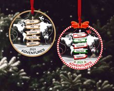 an ornament hanging from a christmas tree with the words adventures written on it