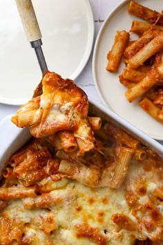 a casserole dish filled with pasta and cheese