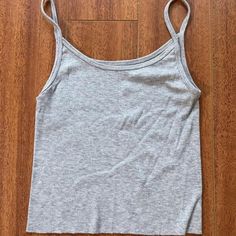 Grey Brandy Melville Ribbed Tank Top No Flaws Brand New Brandy Melville Clothes, Dark Fits, Brandy Melville Zelly Top, Zelly Top, Brandy Melville Shirts, Preppy Fits, Brandy Melville Tank Top, Brandy Melville Tank, Gray Tank Top