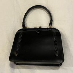 Vintage Black Leather Purse With Green Lining. Originally Purchased Milan. No Label. Mid-century Black Bags For Vintage Style, Vintage Black Textured Leather Bag, Retro Black Bags With Gold-tone Hardware, Black Vintage Bag With Snap Closure, Vintage Black Rectangular Coin Purse, Black Leather Purse, Leather Purses, Vintage Black, Mini Bag