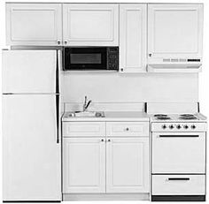 a kitchen with white cabinets and appliances in black and white text that reads model ks04