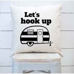 a pillow that says, let's hook up on the back of a chair