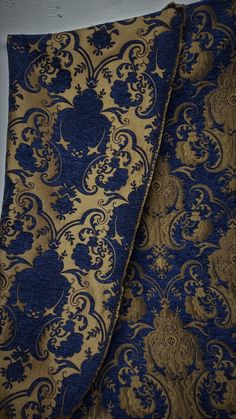 the blue and gold fabric is very intricate