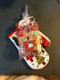 a pair of flip flops with food in them on top of a table next to other items