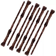 six wooden dowels are lined up on a white background