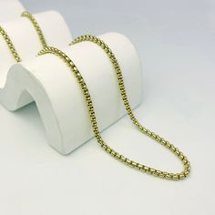 This trendy chain necklace is the perfect way to add a touch of personality to your look. The unique box chain design is both stylish and modern, and the versatile length makes it easy to wear with any outfit. Layer it with other necklaces for a more personalized look, or wear it alone for a minimalist statement.Available in gold and silver. Trendy Delicate Snake Chain Necklace Gift, Trendy Gold Box Chain Necklace, Trendy Metal Snake Chain Necklace As Gift, Trendy Metal Snake Chain Necklace For Gifts, Rectangular Rolo Chain Necklace As A Gift, Gift Snake Chain Necklace With Delicate Chain, Rectangular Rolo Chain Necklace Gift, Modern Box Chain Necklace Gift, Minimalist Necklace With Rectangular Box Chain Links