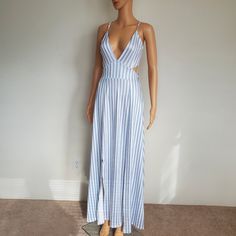 Blue And White Vertical Striped Dress Stretchy Halter Tie At Back Elastic Waist Two Slits On Skirt Backless Beach Dress With Side Slits, Blue V-neck Maxi Dress With Side Slits, Elegant Split Midi Dress For Beach, Casual Split Dress For Party, Casual Party Dress With Split, Maxi Length Beach Cover-up Dress With Side Slits, Summer Maxi Dress With Side Slits For Brunch, Summer Brunch Midi Dress With Split, Maxi Length Dresses With Side Slits For Beach Cover-up