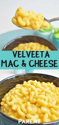 a spoon full of macaroni and cheese on top of a blue plate with the words, velveeta mac & cheese