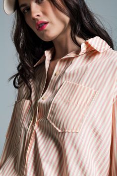 Discover the effortless charm of our Light Orange Oversized Blouse, adorned with crisp white stripes, a must-have addition to your summer collection. Breathable Fabric Composition: Crafted from 100% Polyester, this blouse ensures both durability and comfort, perfect for warm summer days. Eye-Catching Design: Featuring a striking light orange hue complemented by elegant white stripes, this blouse stands out with its refreshing color palette. Versatile Oversized Fit: Designed to run big with an ov Spring Oversized Blouse With Striped Collar, Oversized Blouse With Striped Collar For Spring, Chic Vertical Stripes Shirt For Daywear, Casual White Blouse With Vertical Stripes, Oversized Summer Shirt With Striped Collar, Summer Long Sleeve Blouse With Vertical Stripes, Spring Collared Tops With Horizontal Stripes, Striped Collared Blouse For Spring, Chic White Shirt With Striped Collar