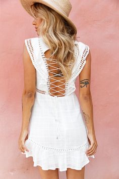 Buy the Reign Sleeveless Lace-Up Back Dress White | Selfie Leslie Sleeveless Dress With Lace-up Back For Day Out, White Mini Dress With Back Zipper For Beach, White Lace Back Mini Dress For Summer, Backless Mini Dress With Lace Trim For Vacation, Backless Lace Trim Mini Dress For Vacation, Lace Back Mini Dress For Summer, Summer Lace Back Mini Dress, Summer Mini Dress With Lace Back, Spring Beach Mini Dress With Corset Back