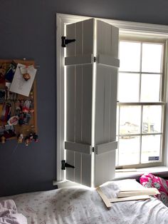 an open door in the corner of a bedroom