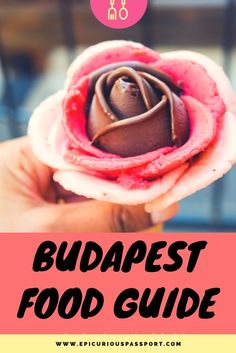 someone holding up a chocolate flower with the caption budapest food guide what and where to eat in budapest, hungry