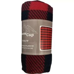 a roll of red and black plaid flannel fabric on top of a white background