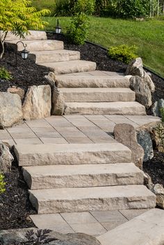 stone steps leading up to a grassy area