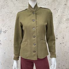 Beautiful Ww2 1944 Dated Women’s Military Field Jacket. Very Well Made. One Tiny Hole On The Ribbed Knit Collar. Otherwise In Excellent Condition. Practically Brand New. Shoulders 15.5" Sleeves 23" Bust 34" (17" Pit To Pit) Waist 30" Hem 35" Length 24.5" Classic Fitted Olive Outerwear, Vintage Stand Collar Outerwear For Work, Vintage Outerwear With Stand Collar For Work, Classic Olive Outerwear With Button Closure, Vintage Olive Outerwear For Work, Fitted Olive Outerwear With Buttons, Vintage Khaki Winter Blazer, Vintage Stand Collar Winter Blazer, Vintage Stand Collar Blazer For Work