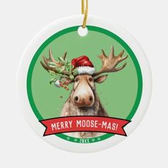 a christmas ornament with an image of a moose wearing a santa claus hat