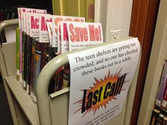 several books are stacked up on a book shelf in a library with signs reading fast cost and save me