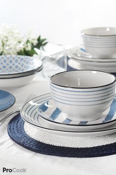 blue and white striped dishes on a table