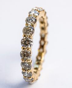 This exquisite diamond eternity ring features round diamonds hand-set in a unique and low-profile platinum setting. Starting at $1800 1.00 carat 14K gold Sapphire Eternity Band, Diamond Half Eternity Band, Diamond Eternity Ring, Half Eternity Band, Initial Ring, Eternity Ring Diamond, Eternity Band Diamond, Diamond Eternity, Rose Gold Diamonds