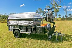 an off road trailer with a bike on the back