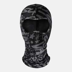 a black and white photo of a face mask with skulls on the front, in camouflage