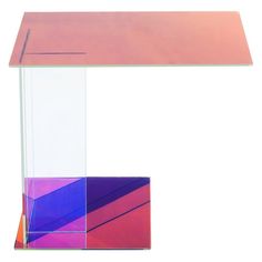 an acrylic side table with pink and blue colors on the top, against a white background