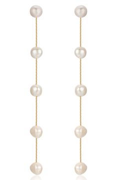 Lustrous freshwater pearls dangle elegantly on long linear drop earrings plated in 18-karat gold. 4 1/8" drop; 3/8" width Pearl size: 8–10mm 18k-gold plate/freshwater pearl Imported Big Bridal Earrings, Hoco Jewelry, Pearl Drop Earrings Wedding, Teardrop Pearl Earrings, Formal Earrings, Formal Jewelry, Jewel Wedding, Bridal Earrings Drop, Gold Statement Earrings