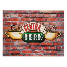 a brick wall with a sign that says central perk