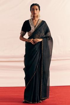 Black silk velvet padded blouse with floral pattern border, applique, thread, bead and sequin embroidered border. Paired with silk organza saree with scalloped cut work hem. - Aza Fashions Formal Blouse With Dupatta For Diwali, Formal Eid Blouse With Dupatta, Formal Fitted Pre-draped Chanderi Saree, Formal Blouse With Sheer Dupatta For Festive Occasions, Formal Unstitched Blouse For Eid, Formal Festive Blouse With Sheer Dupatta, Formal Pre-draped Saree With Unstitched Blouse For Transitional Season, Black Cotton Silk Fitted Saree, Traditional Formal Blouse With Sheer Dupatta