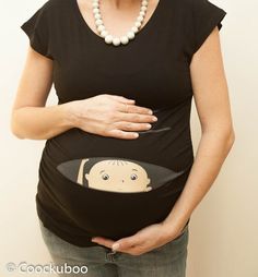 This listing is for a Coockuboo natural baby Or baby girl peeking.  Elegant black color maternity shirt. All our maternity shirts are high quality, soft and stretchy and has a very flattering fit. *  True maternity shirt - woman flattering sizes : S - XL *  Cotton / Lycra - supper soft and stretchy *  High quality screen print *  Scoop neck *  Side ruched *  Available in 6 colors: Black, White, Red, Dark Blue, Gray, Fuchsia Pink.  *  2 different sweet and charming baby models : Natural baby or B Maternity Cotton T-shirt Bump Friendly, Cute Maternity Cotton T-shirt, Cute Maternity T-shirt With Graphic Print, Cute Maternity Graphic Print T-shirt, Pregnancy Wear, Baby Shower Shirts, Gift Idea For Mom, Maternity Shirt, Maternity Tees