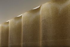 an intricately designed wall is shown in this image, it looks like waves are covering the