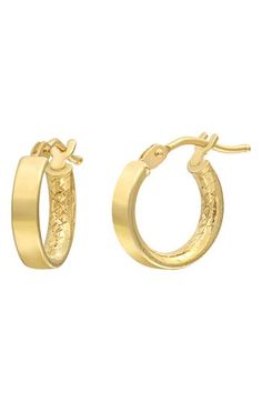 A flat silhouette and textured interior maximize the shine of these handcrafted hoop earrings. 1/2" hoop diameter; 1/8" width Snap-post closure 14k gold Imported Modern Hammered Hoop Earrings For Formal Occasions, Modern Hammered Hoop Earrings For Formal Events, Small Hoop Hinged Huggie Earrings For Anniversary, 14k Gold Hinged Hoop Earrings For Formal Occasions, Small Hammered Hoop Earrings For Formal Occasions, Gold Hammered Round Huggie Earrings, Hammered Gold Round Huggie Earrings, Small Hoop Hinged 14k Gold Jewelry, 14k Gold Small Hoop Hinged Jewelry