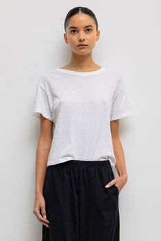 #color_white Classic Relaxed Fit T-shirt For Loungewear, Classic Crew Neck T-shirt For Loungewear, Relaxed Fit T-shirt With Straight Hem For Everyday, Everyday Relaxed Fit T-shirt With Shirttail Hem, Classic T-shirt With Shirttail Hem For Everyday, Classic Solid Color Top With Straight Hem, Classic Solid Color Tops With Straight Hem, Classic Scoop Neck Relaxed Fit T-shirt, Basic Short Sleeve T-shirt For Casual Gatherings