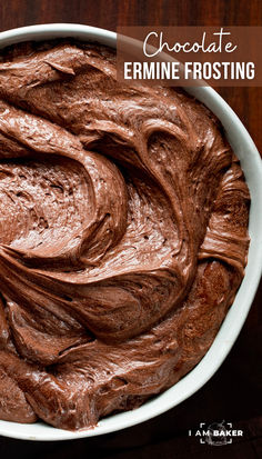 chocolate frosting in a white bowl on top of a wooden table with text overlay