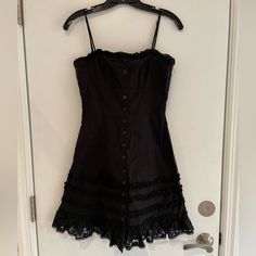 Betsey Johnson Black 100% Cotton Mini Dress. Adjustable Straps, Buttons Down The Front To Multiple Tiers Of Lace. Size 6 Fits More Like A 4. Ask If You Have Any Questions. Gothic Babydoll Dress, Cotton Mini Dress, Betsey Johnson Dresses, Betsy Johnson, Size 6 Dress, Babydoll Dress, Betsey Johnson, A 4, Black Cotton