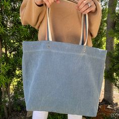 The Quinn Collection is designed to transition with you from season to season. The soft denim shade will add a pop of interest to any neutral outfit. Available in shouldersac, crossbody, and pouch.Material: 100% linen - washed finish Dimensions: 36"x38"x15" Shipping: Items in stock will ship within 2-3 business days. Please see our Shipping terms for more information. Denim Blue Cotton Shoulder Bag, Linen Tote Shoulder Bag, Cotton Bag In Medium Wash For Daily Use, Daily Use Medium Wash Cotton Bag, Denim Blue Cotton Shoulder Bag For On-the-go, Everyday Linen Shoulder Bag With Pockets, Casual Medium Wash Cotton Shoulder Bag, Denim Blue Cotton Bags For Everyday Use, Everyday Linen Tote Canvas Bag