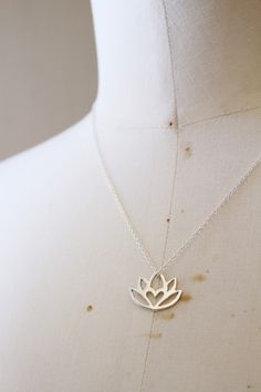 An original Lola&Cash protea necklace featuring a hidden heart -- d e t a i l s -- -protea measures 2cm wide -hand sawn out of solid sterling silver -completed in a mirror finish -includes a 45cm chain This pendant is also available in gold as seen in last picture https://www.etsy.com/listing/621948340/gold-protea-pendant-solid-9ct-yellow?ref=shop_home_active_1 -All Lola&Cash jewellery will arrive gift wrapped ---------------------------------------- Please Note - Made to order - Rush or Delicate Small Jewelry Gift, Delicate Jewelry For Gifts, Silver Birth Flower Necklace For Wedding, Delicate Silver Flower-shaped Charm Necklace, Delicate Silver Flower Shape Charm Necklace, Minimalist Silver Birth Flower Jewelry, Minimalist Silver Jewelry With Birth Flower, Delicate Silver Charm Necklace For Mom, Minimalist Silver Flower Pendant Necklaces