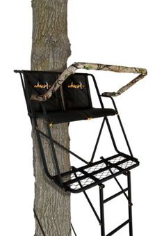 a tree stand that is next to a tree