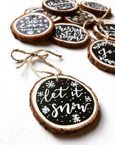 wooden slice ornaments with chalkboard saying let it snow