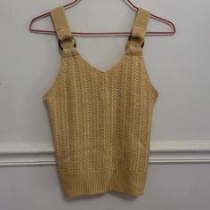 Hippie Rose Tank This Mustard Yellow Knit Tank Has Round, Tortoise Shell Eyelets On The Straps. It Has Small Slits On Each Side Of The Hem. 100% Acrylic Size Xs Length Measures At 19 Inches Chest Width Measures At 13 Inches Measurements Are Approximate. Nwot (New Without Tags) Smoke Free And Pet Free Home! Yellow Knitted V-neck Top, Casual Yellow Sleeveless Knit Top, Summer Yellow Knit Top, Casual Yellow Knitted Top, Mustard Knit Tops For Spring, Spring Mustard Knit Tops, Casual Gold Sleeveless Top, Gold Sleeveless Casual Top, Casual Mustard Knit Top