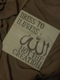 there is a sign that says dress to impress and not the creation