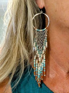 Southwest Style Shoulder Duster Earrings in Turquoise, Cream and Orange on Silver Hoops - Etsy Southwestern Style Beaded Earrings With Ear Wire As Gift, Adjustable Southwestern Beaded Earrings With Ear Wire, Bohemian Chandelier Earrings With Beaded Chain, Southwestern Turquoise Jewelry With Ear Wire, Turquoise Bohemian Earrings With Beaded Chain, Bohemian Turquoise Beaded Chain Earrings, Southwestern Adjustable Dangling Bead Earrings, Southwestern Fringe Dangle Jewelry, Shoulder Duster Earrings