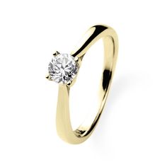 a yellow gold engagement ring with a single diamond in the center, on a white background