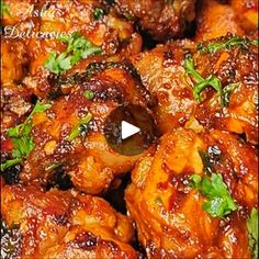 chicken wings with sauce and parsley on top