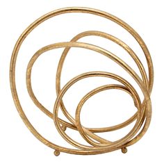 a set of gold colored rings on a white background