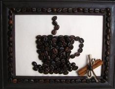 coffee beans are arranged in a frame on the wall